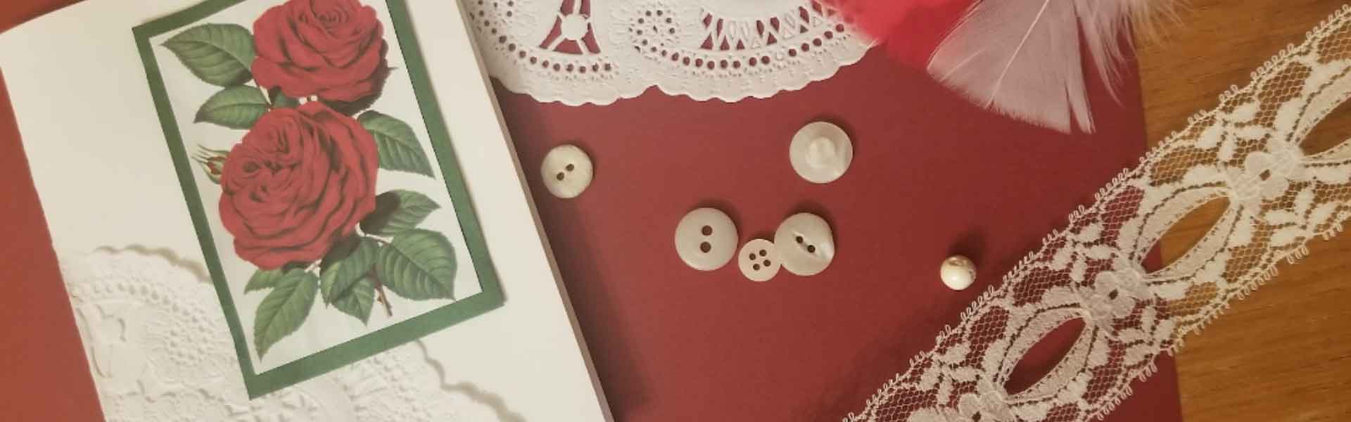 Greeting card with buttons and feather