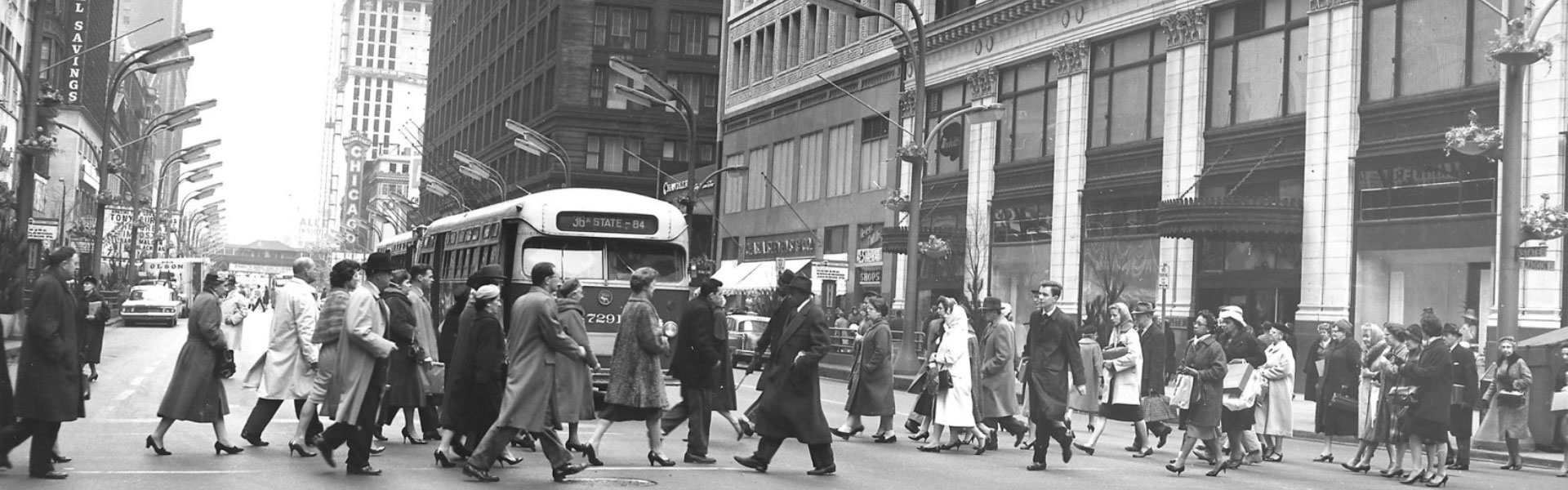 people walking in downtown Chicago visiting department stores