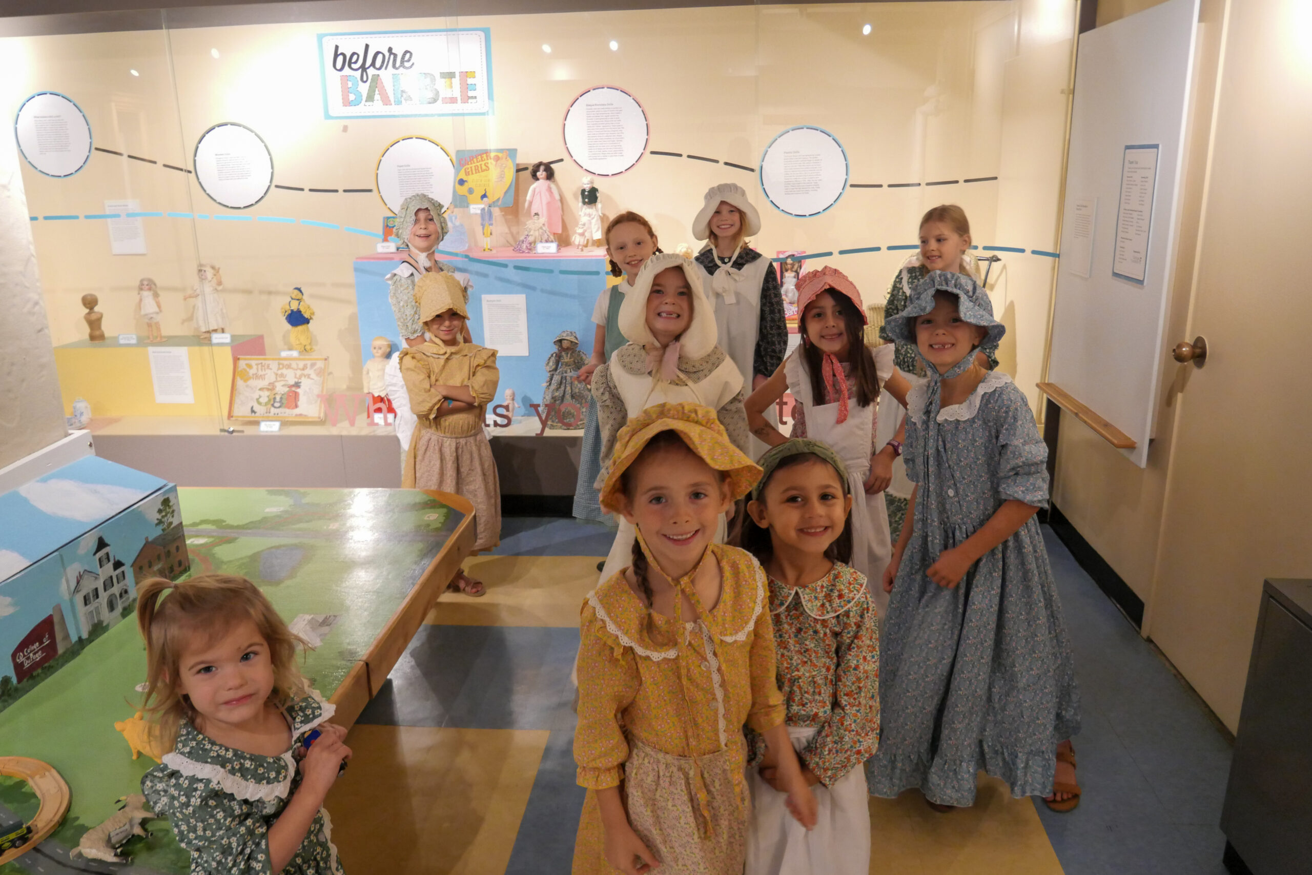 DCHM Birthday Tea Party Theme A group of girls dressed in historical dresses